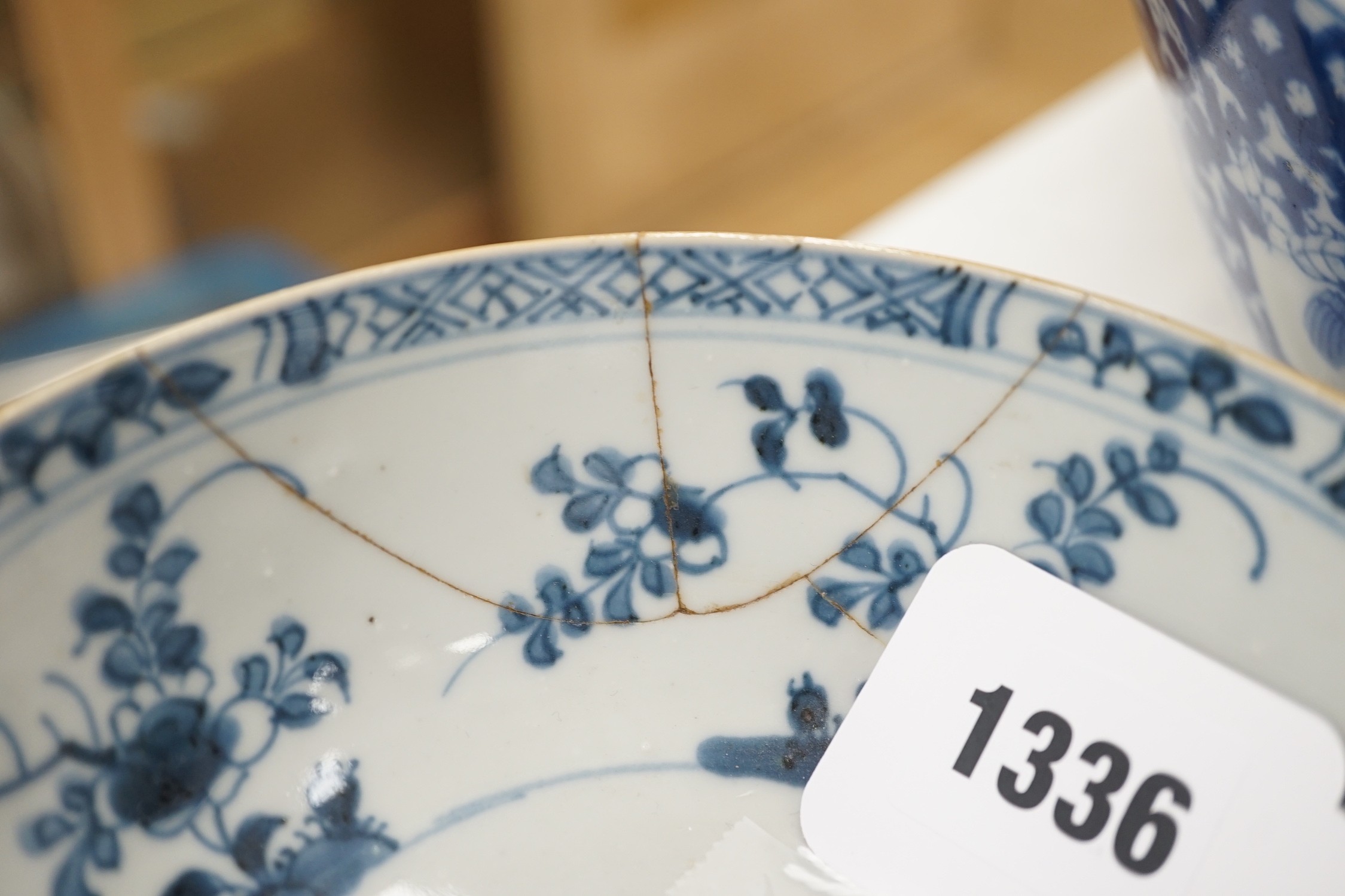 An assortment of Chinese porcelain tin-glazed earthenware charger and a Delft vase
